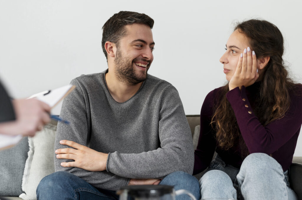close up smiley couple therapy